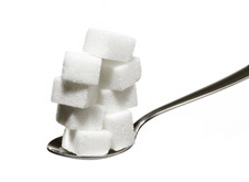 sugar cubes on a spoon