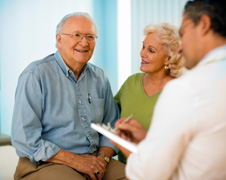 older couple talking to doctor