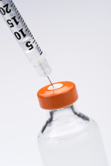 botella de insulina con jeringa
